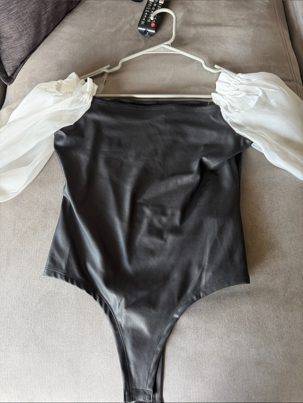 bebe Black One-Piece Bodysuit with White Puff Sleeves